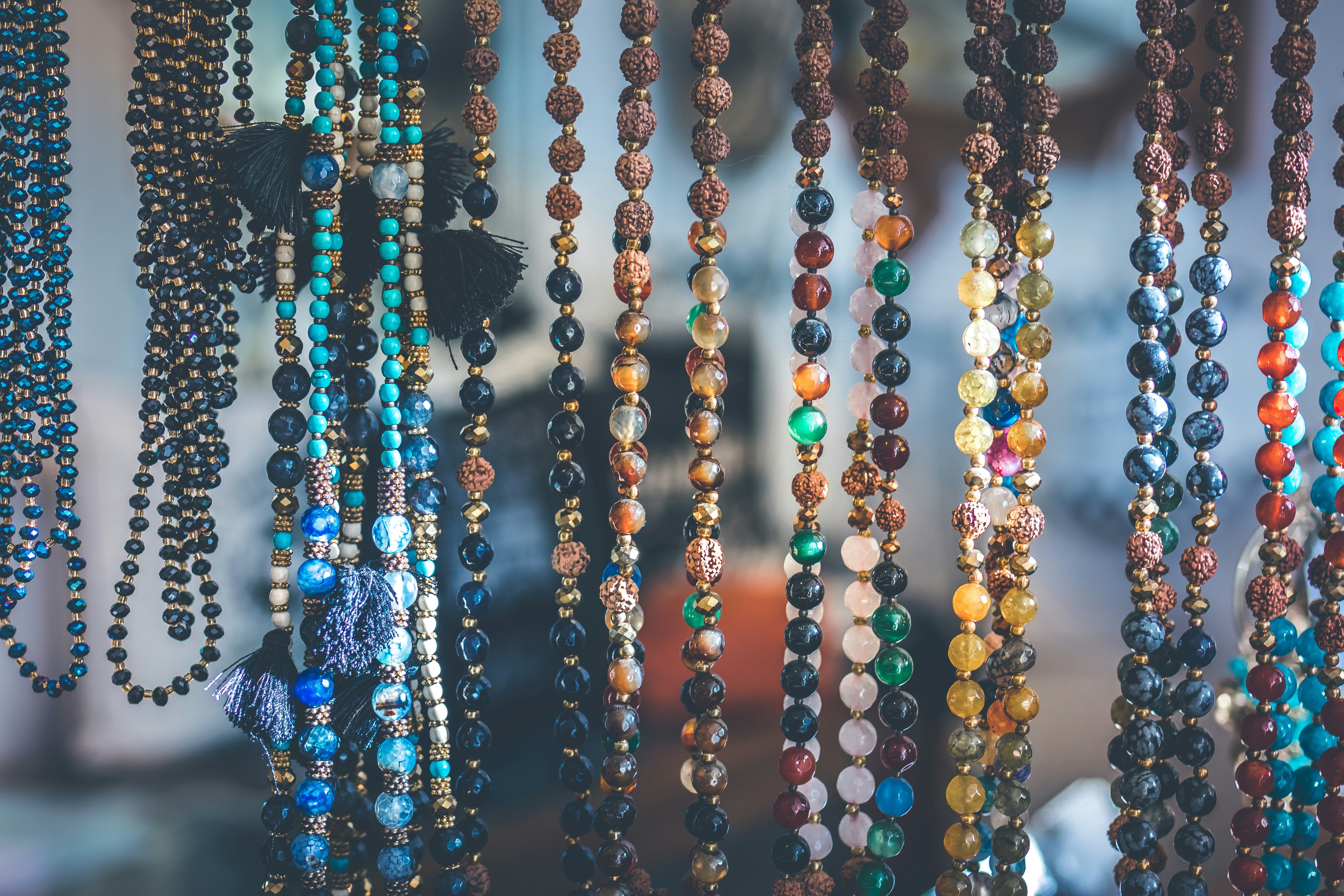 close up photo of beaded necklaces